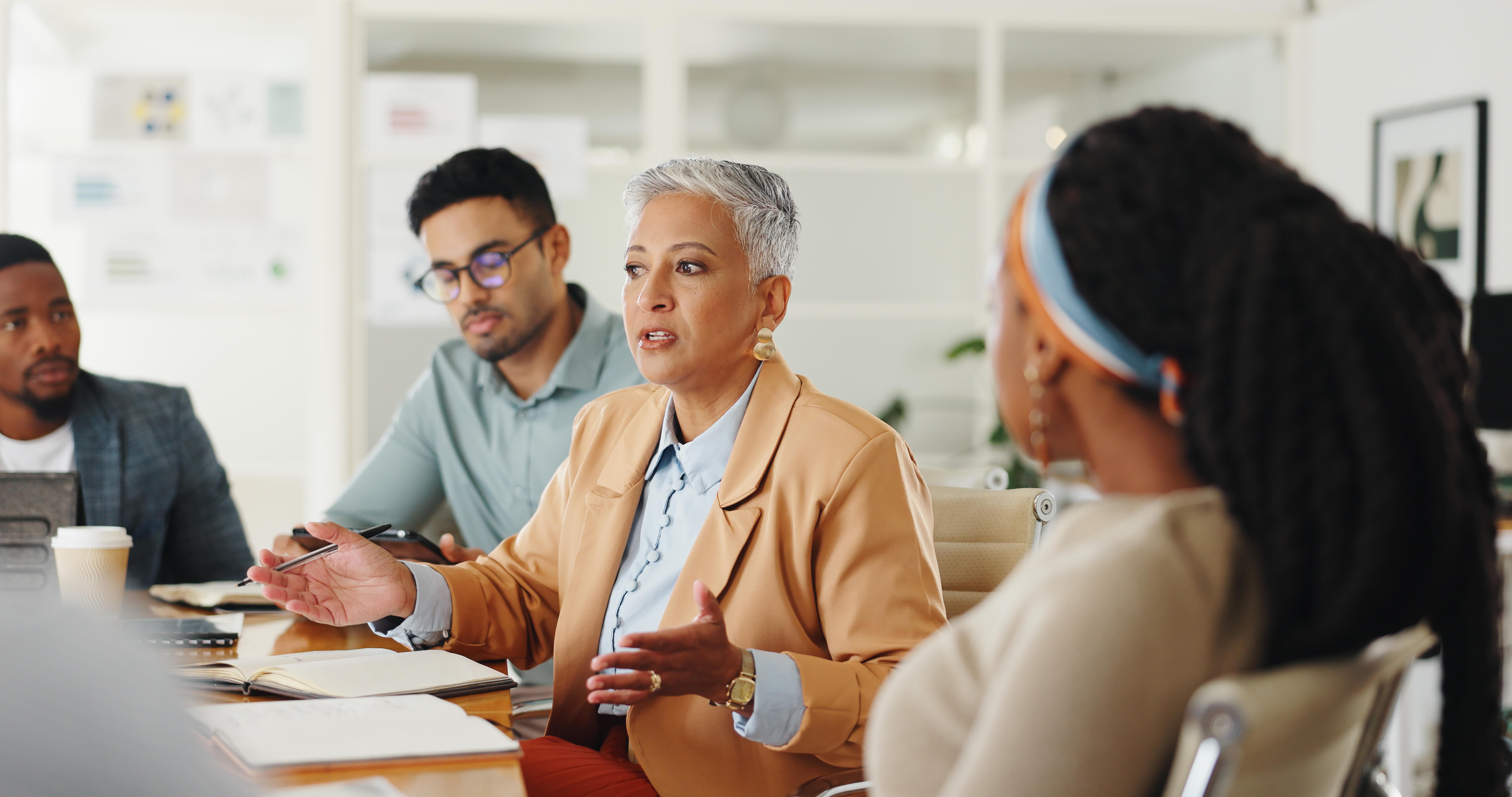 Broker exploring benefits options with clients